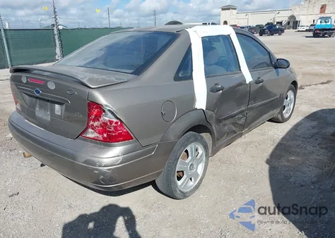 2004 Ford Focus Zts z USA, uszkodzony, nr VIN 1FAFP38Z84W183828